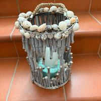 Portacandele in vetro e conchiglie