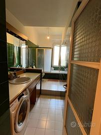 Posto letto in ampia stanza