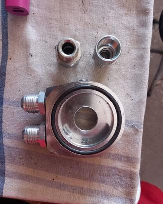 Adattatore sandwich per radiatore olio