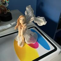 Statuetta fatina con ali scintillanti