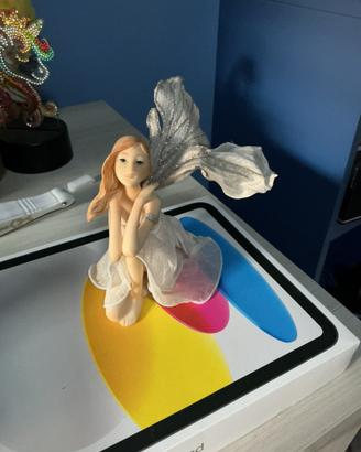 Statuetta fatina con ali scintillanti