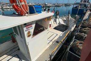 barca da pesca con licenza