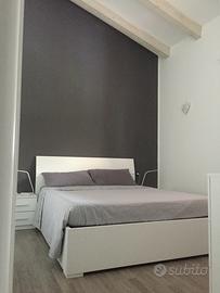 Letto contenitore con comodini