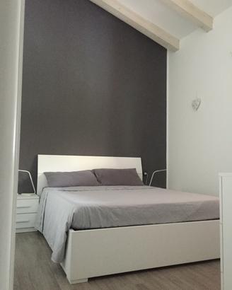 Letto contenitore con comodini