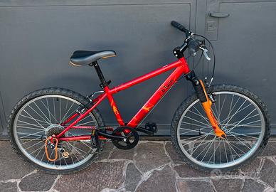 Bici MTB Rockrider con cambio Shimano ruota 24