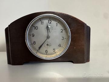 Orologio antico da camino