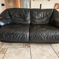 Divano letto in pelle nera Natuzzi 