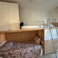 Letto a castello 3 posti con armadi e cassetti
