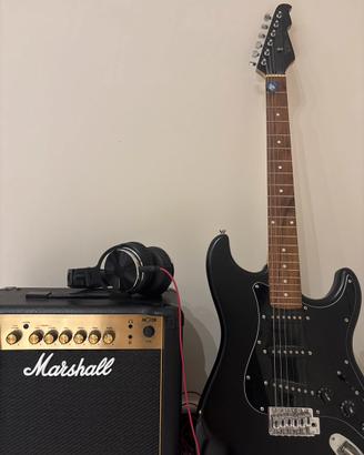Chitarra elettrica con amplificatore e accessori.