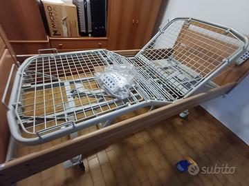 Letto ortopedico elettrico con sponde