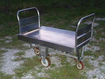 Carrello manuale 4 ruote. In inox. "Portatutto".