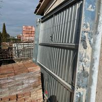 PORTA BASCULANTE IN LAMIERA ZINCATA PER GARAGE