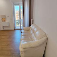 Divano 4 posti in pelle bianco