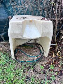 Cisterna copertura legna