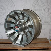 JEEP WAGONEER CERCHI ORIGINALI 7x15 con coppe