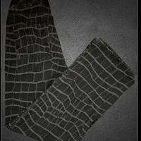 Jeans com cuciture pitonato