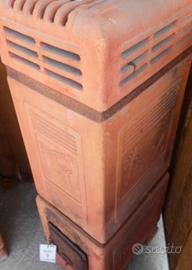 Stufa forlivese terracotta "simun"palma e dromedar
