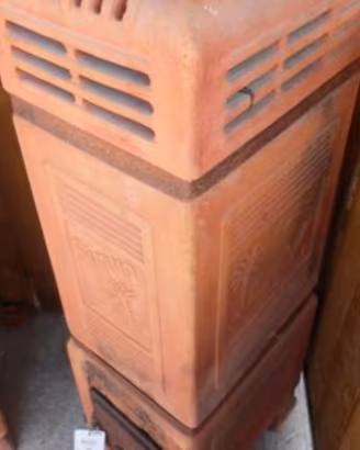 Stufa forlivese terracotta "simun"palma e dromedar
