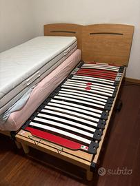 Coppia di letti elettrici con materasso