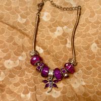 Bracciale in acciaio con charme.