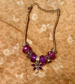 Bracciale in acciaio con charme.