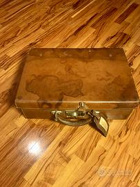 Valigia vintage in pelle con necessaire