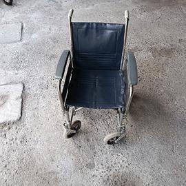 sedia rotelle pieghevole 