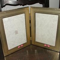 Cornice doppia in alluminio dorato con decori