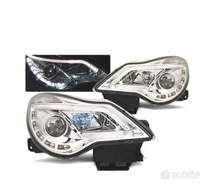 FARI TRU DRL PER OPEL CORSA D 11-14 CROMATI
