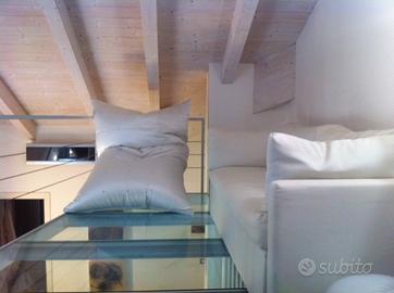 Attico mansardato alto