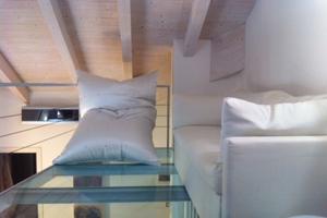 Attico mansardato alto