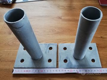 supporti per palo tondo con tasselli ancoranti