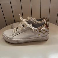 Scarpe bianche e oro numero 36