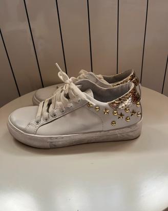 Scarpe bianche e oro numero 36