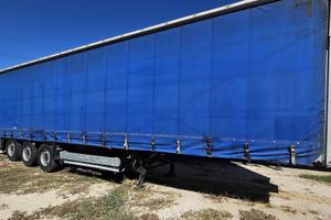 Schmitz Cargobull semirimorchio centinato 3 assi