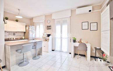 TRILOCALE CON VERANDA CHIUSA AL PIANO RIALZATO!!!