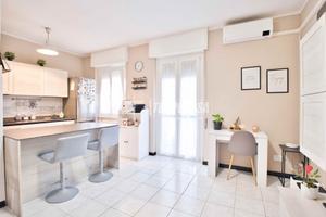 TRILOCALE CON VERANDA CHIUSA AL PIANO RIALZATO!!!