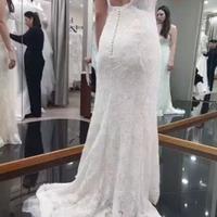 Abito da sposa romantico con fiocchi e perline