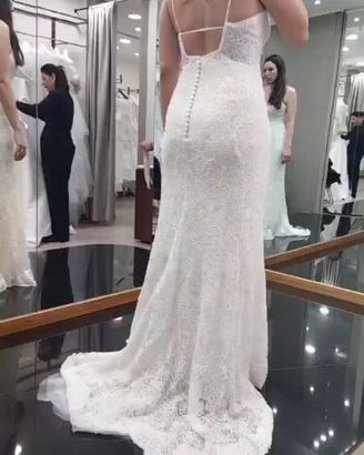 Abito da sposa romantico con fiocchi e perline