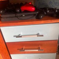  PS4 con tre controller e giochi usati