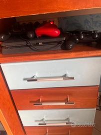  PS4 con tre controller e giochi usati