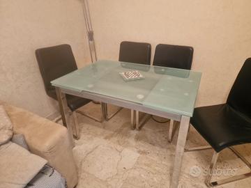  tavolo vetro e acciaio+ 4 sedie 