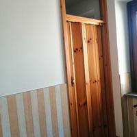 porta con chiusura a libro