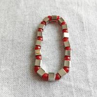 Bracciale elastico con cubetti in acciaio e perlin