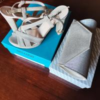 Sandali con tacco platino con pochette abbinata