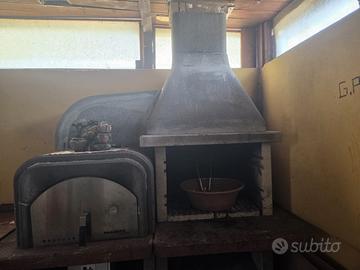 Barbecue in pietra con forno per pizza