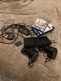 Playstation 2 + controller (2) +adattatore+ giochi