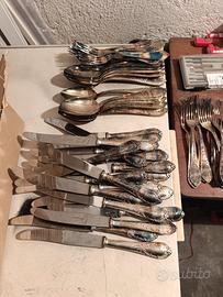 109 posate bagnate in argento 