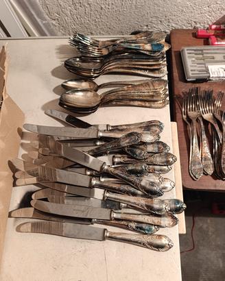 109 posate bagnate in argento 