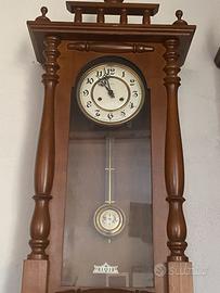 Orologio a pendolo antico
